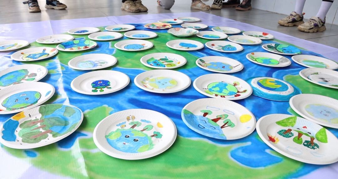 宁远：创意画笔绘地球 净滩行动护家园